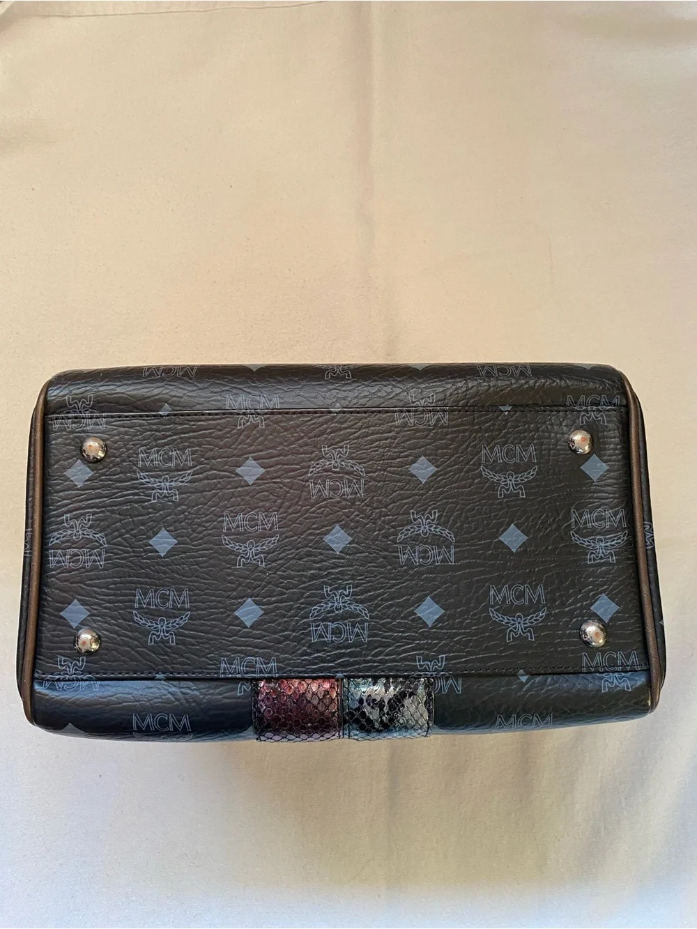 MCM Black Leather Boston Bag with Lion Motif and Mixed Snake-Print Accents